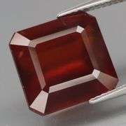 High grade 11.98ct red orange Hessonite Garnet