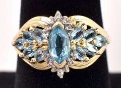 Glistening 10K Yellow Gold Blue Topaz and Diamond Ring