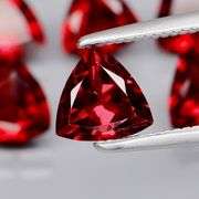Trillion cut 5.52ct cherry red Garnet set