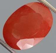 Large collectors 5.38ct blood orange Andesine Labradorite
