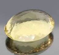 Glistening 128.22ct oval vivid golden Citrine