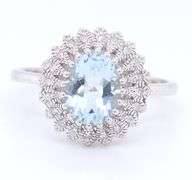 Gorgeous White Gold oval Aquamarine and accent Diamond Halo Ring