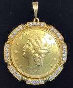 1904 GOLD COIN FRAMED IN 14K YELLOW GOLD AND ROUND BRILLIANT DIAMONDS