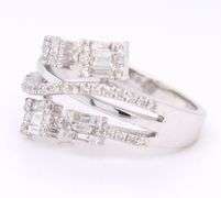 14kt White gold 1ctw princess, round and baguette bypass diamond ring