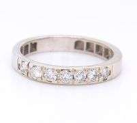 Sparkling White Gold Seven Stone Diamond Band