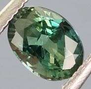 Party color! .60ct blue green Sapphire -Heated only!