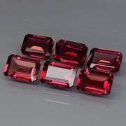 Amazing 4.86ct emerald cut Garnet set