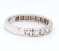 Sparkling White Gold Seven Stone Diamond Band