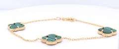 14kt Yellow gold three clover malachite link bracelet