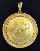 1904 GOLD COIN FRAMED IN 14K YELLOW GOLD AND ROUND BRILLIANT DIAMONDS