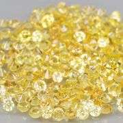 Fantastic 4.71ct diamond cut yellow Sapphire set