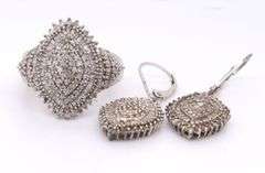 Set of 925 sterling silver cubic zirconia ring and matching dangle earrings