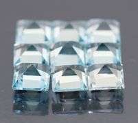 Amazing 12.20ct radiant cut ice blue Topaz set