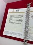 CERTIFIED 14K WHITE GOLD AND DIAMOND BRACELET.
