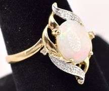 Alluring 10K Yellow Gold approx. 1.18 CTS Opal and Diamond Ring