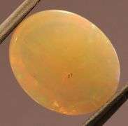 Brilliant flashing 1.83ct semi-black Opal