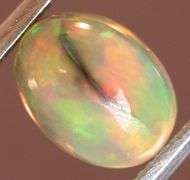 Glowing! 1.20ct full cover floral pattern Jelly Opal