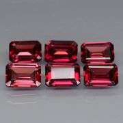 Amazing 4.86ct emerald cut Garnet set