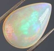 Gorgeous green and indigo flashing 3.72ct Jelly Opal