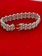 CERTIFIED 14K WHITE GOLD AND DIAMOND BRACELET.