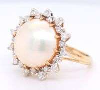 Powerful Mabe Pearl and Diamond Halo Ring in Yellow Gold