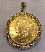 1904 GOLD COIN FRAMED IN 14K YELLOW GOLD AND ROUND BRILLIANT DIAMONDS