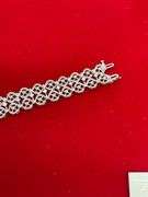 CERTIFIED 14K WHITE GOLD AND DIAMOND BRACELET.