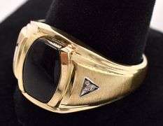Ambitious 10K Yellow Gold Black Onyx and Diamond Men's Ring