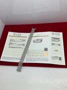 CERTIFIED 14K WHITE GOLD AND DIAMOND BRACELET.