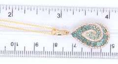 14kt Yellow gold Spinel and diamond swirl teardrop pendant on chain necklace