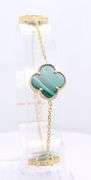14kt Yellow gold three clover malachite link bracelet