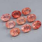Dazzling 7.26ct faceted Strawberry Quartz set