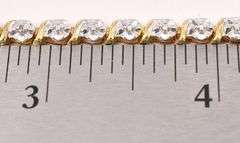 Sterling Silver Vermeil Diamond Tennis Bracelet with a Blue Sapphire Heart Dangle Charm