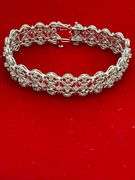 CERTIFIED 14K WHITE GOLD AND DIAMOND BRACELET.