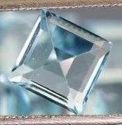 Amazing 12.20ct radiant cut ice blue Topaz set