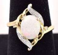 Alluring 10K Yellow Gold approx. 1.18 CTS Opal and Diamond Ring