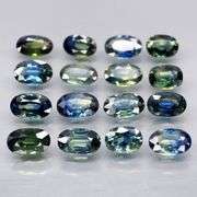 Heated only! 4.99ct blue green sapphire set