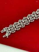 CERTIFIED 14K WHITE GOLD AND DIAMOND BRACELET.