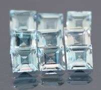Amazing 12.20ct radiant cut ice blue Topaz set