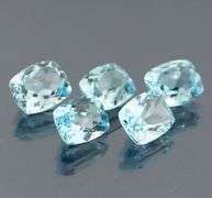 Dazzling 8.58ct vivid blue cushion cut Topaz set