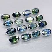 Heated only! 4.99ct blue green sapphire set