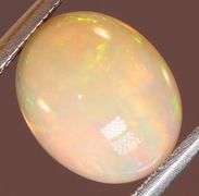 Brilliant flashing 1.83ct semi-black Opal