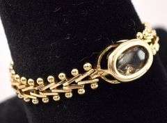 Interesting 14K Yellow Gold Flexible Smokey Quartz Ring
