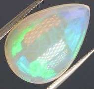 Gorgeous green and indigo flashing 3.72ct Jelly Opal