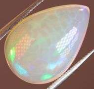 Gorgeous green and indigo flashing 3.72ct Jelly Opal