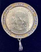 1904 GOLD COIN FRAMED IN 14K YELLOW GOLD AND ROUND BRILLIANT DIAMONDS