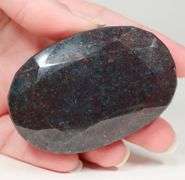 Heavy! 950ct oval cut Ruby in Kyanite