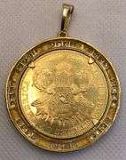 1904 GOLD COIN FRAMED IN 14K YELLOW GOLD AND ROUND BRILLIANT DIAMONDS