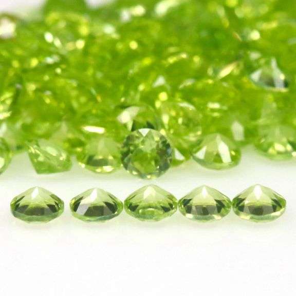 Dazzling 12.02ct untreated apple green Peridot set