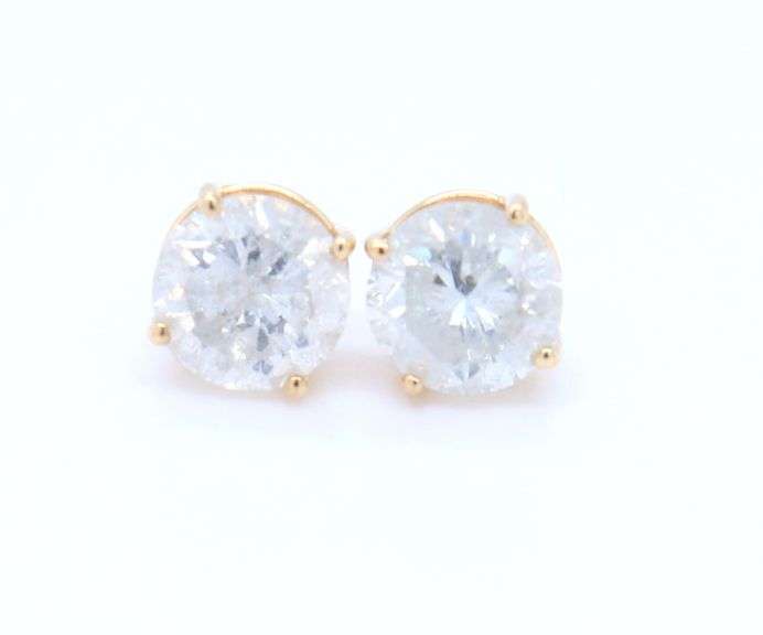 14kt Yellow gold 1.30ctw round brilliant cut diamond stud earrings
